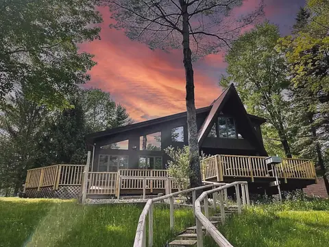 Serenity A-Frame exterior before premium hero treatment